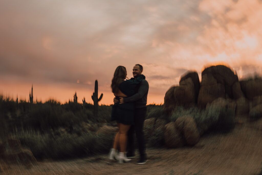 Couple in Arizona desert at sunset